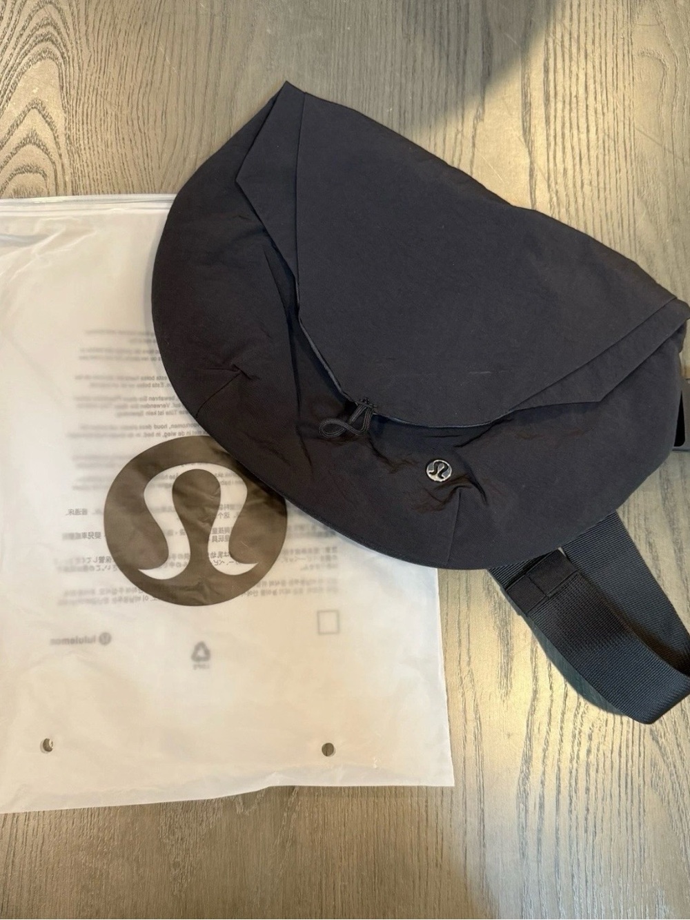 Lululemon athletics Black Curved Crossbody Bottle Bag